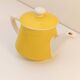 Théière Villeroy & Boch en porcelaine jaune et blanche