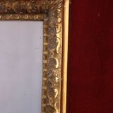 Miroir en stuc doré de style 67 x 52 cm