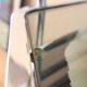 Chrome and smoked glass dressing table with a nesting seat, 1970.