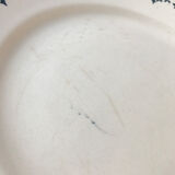 Round serving dish from the Longchamp earthenware factory, Doria model. Iron Land