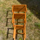 Vintage nesting table in chalet pine.