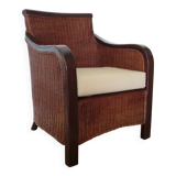 Vintage colonial-style armchair in woven rattan and exotic wood