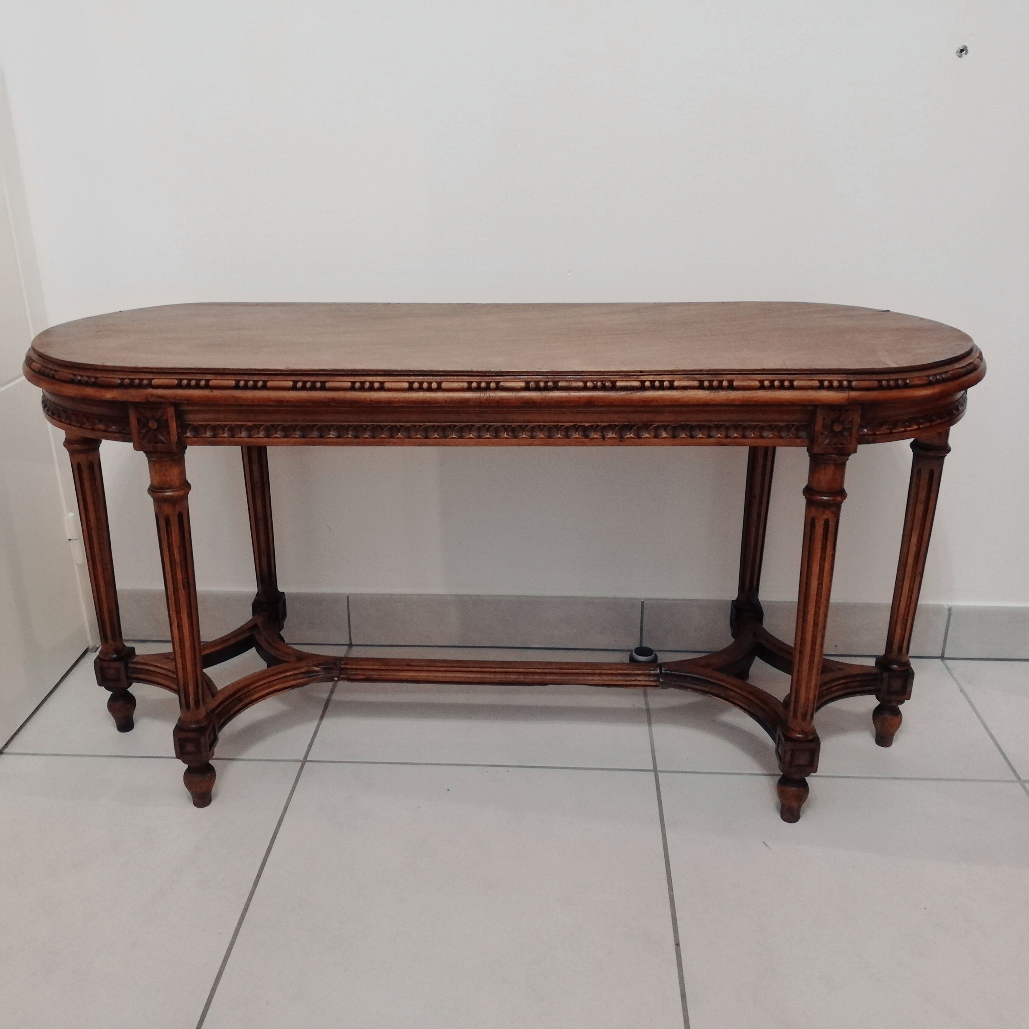 Banc de piano en chêne sculpté