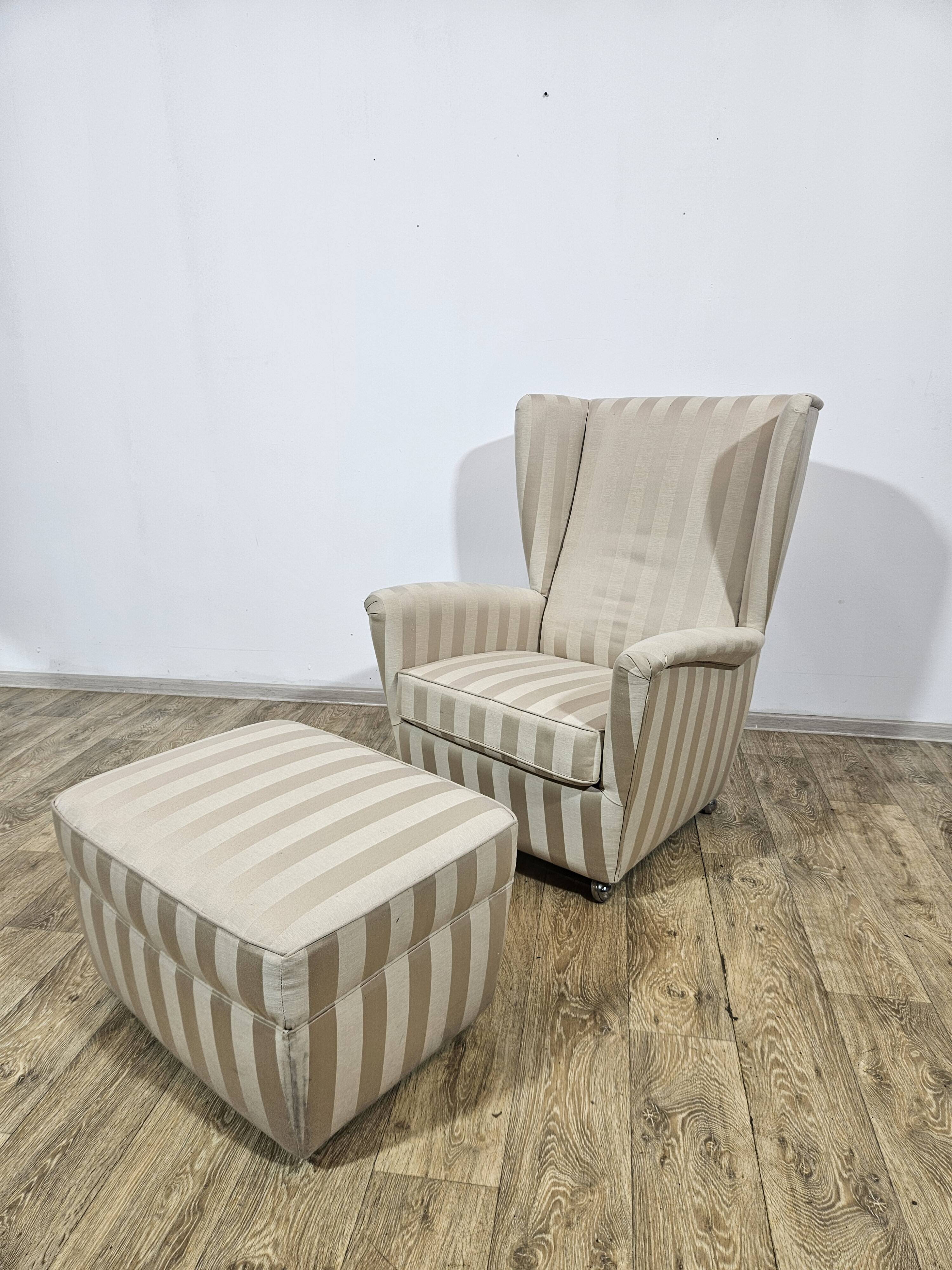 Winged armchair with footstool, 1960s.