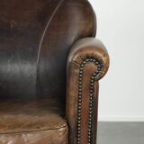 Characterful sheepskin design armchair with beautiful patina
