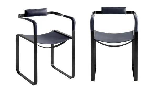 Pair of wanderlust armchairs in black and black metal.