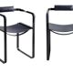 Pair of wanderlust armchairs in black and black metal.