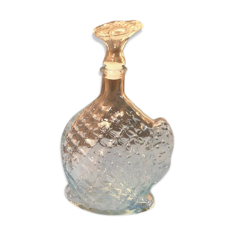 Worked glass carafe and flower-shaped stopper