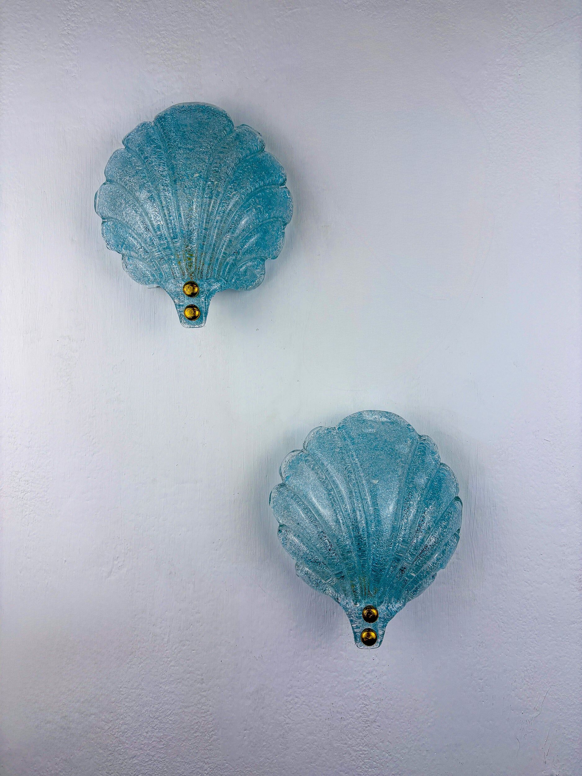 Pair of shell-shaped frosted blue Murano glass wall sconces, Italy, 1970s