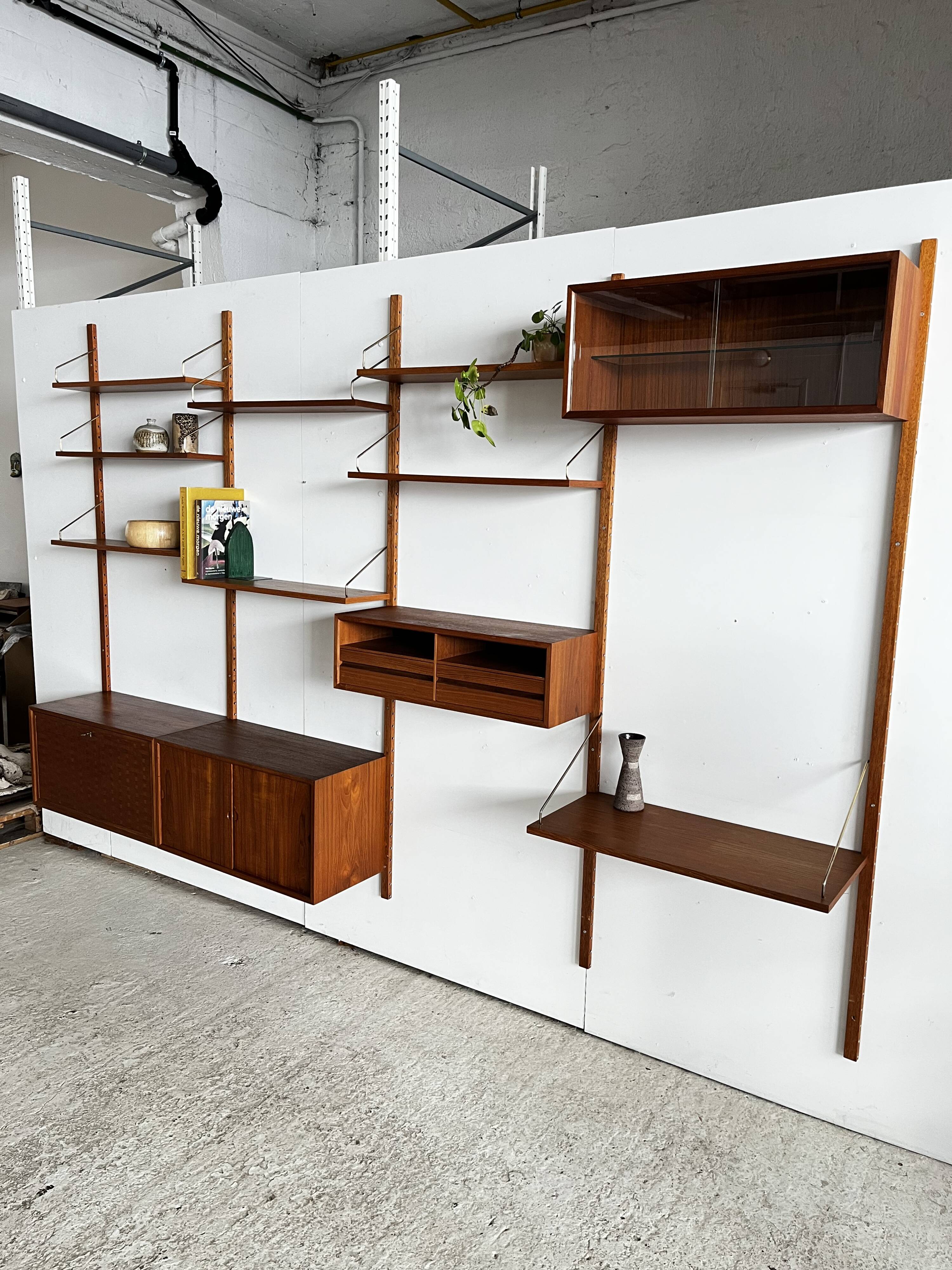 A wall unit with 4 compartments by Poul Cadovius, Denmark, 1960s.
