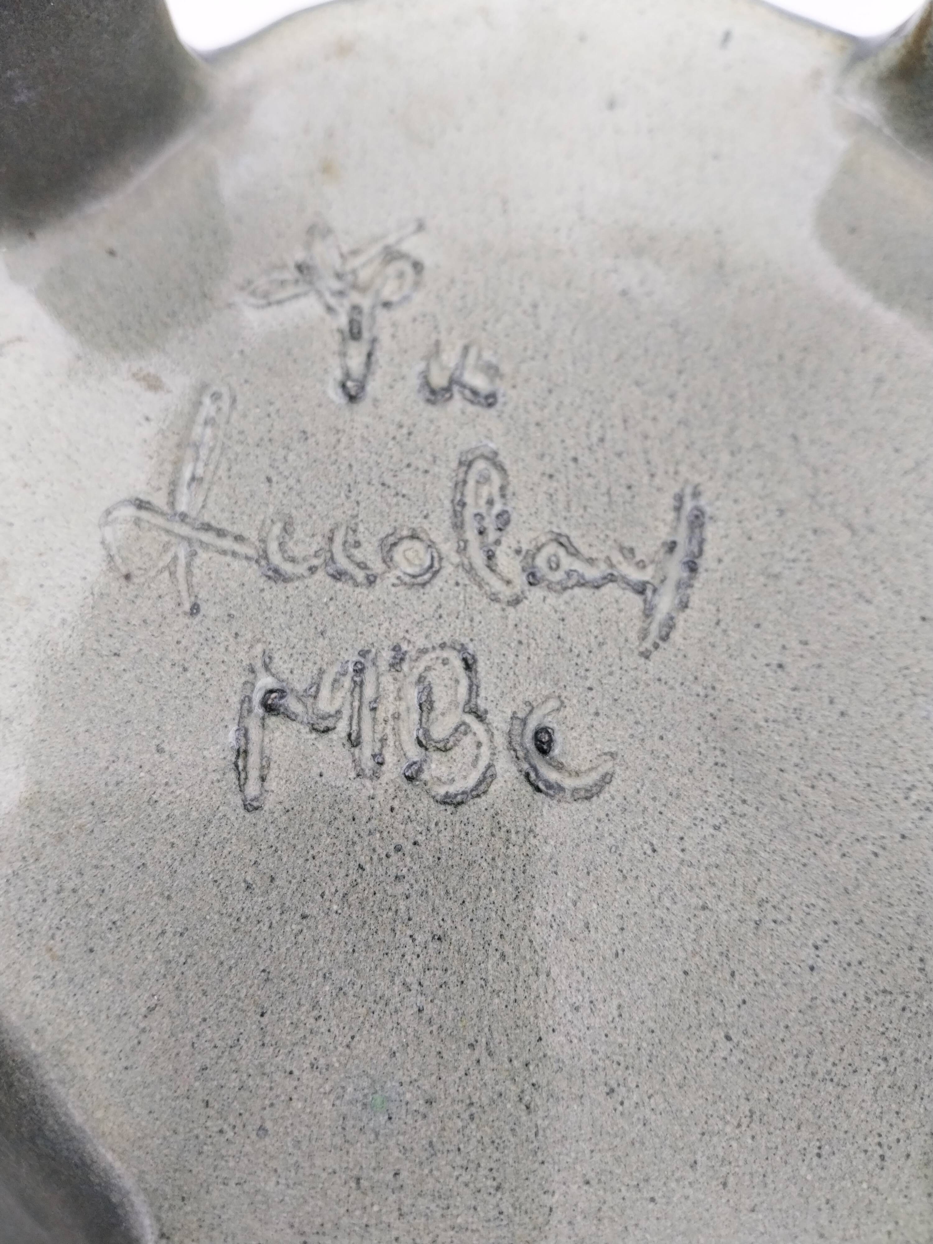 Accolay signed pot cover