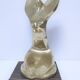 Gilded bronze and sculptural wood paperweight