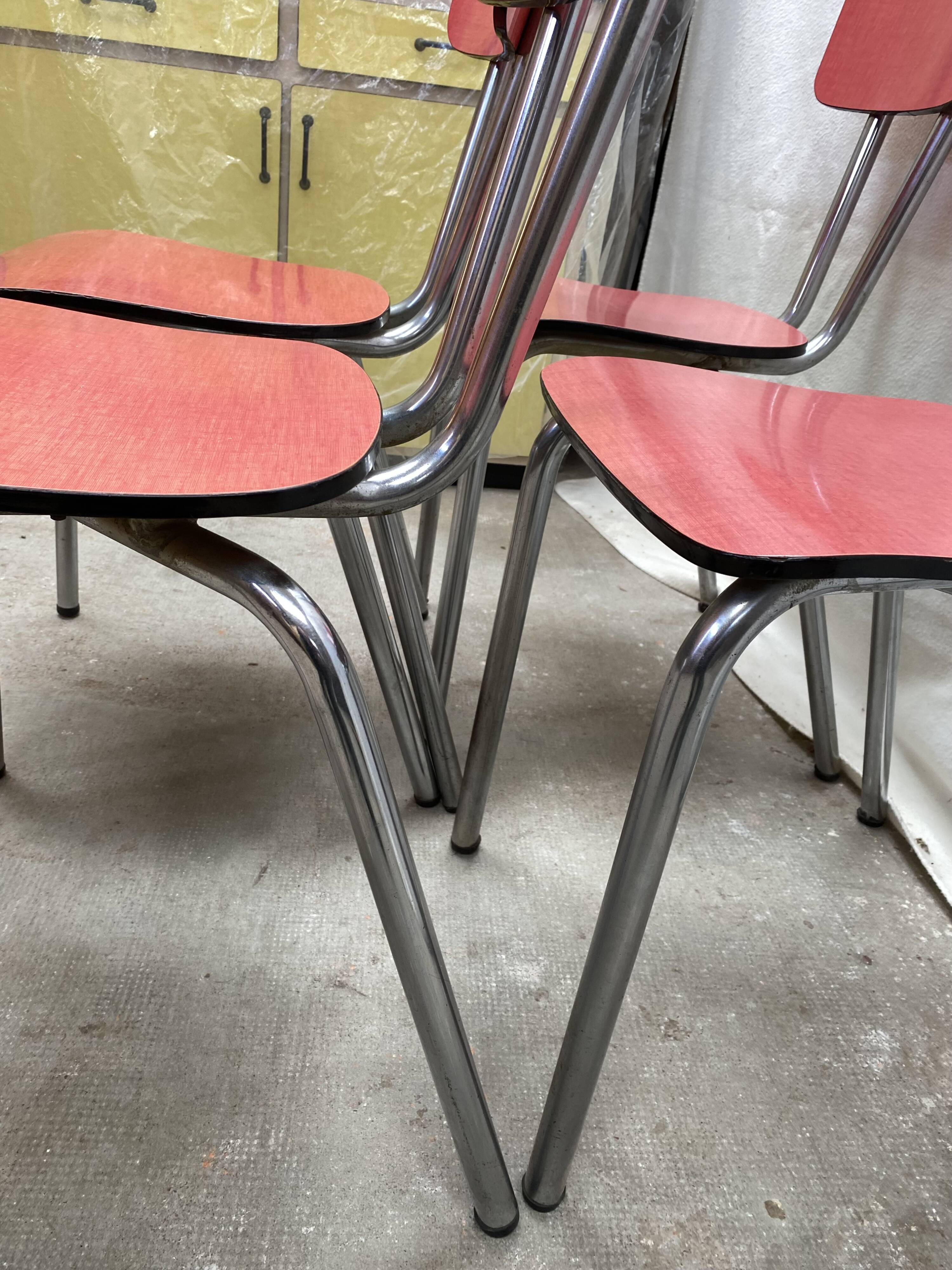 Suite of 4 red formica chairs