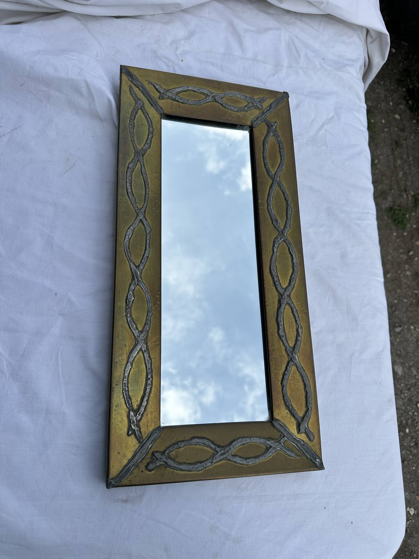 Brutalist mirror by Jean Goardere