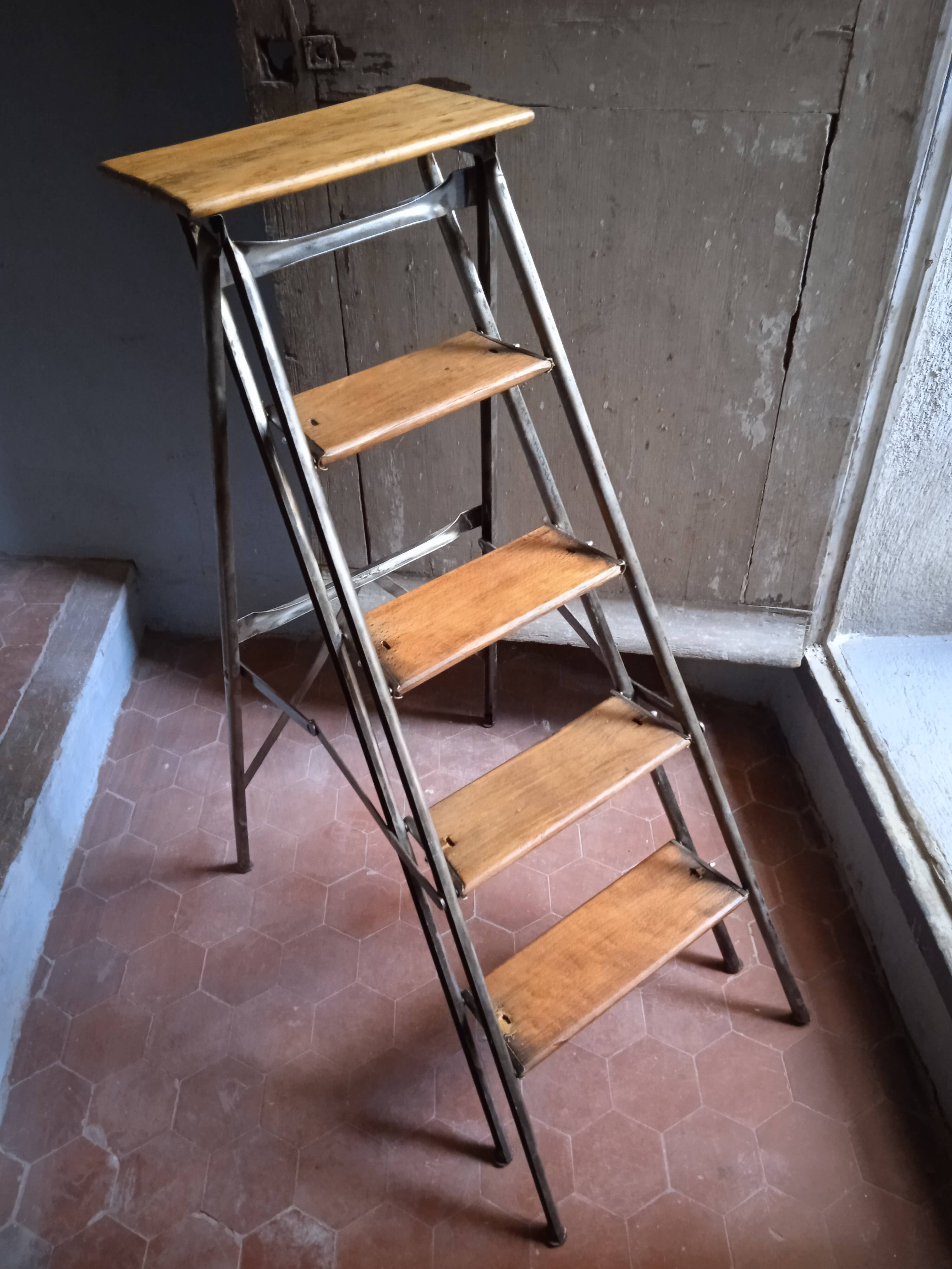 Vintage iron and wood stepladder with 5 steps