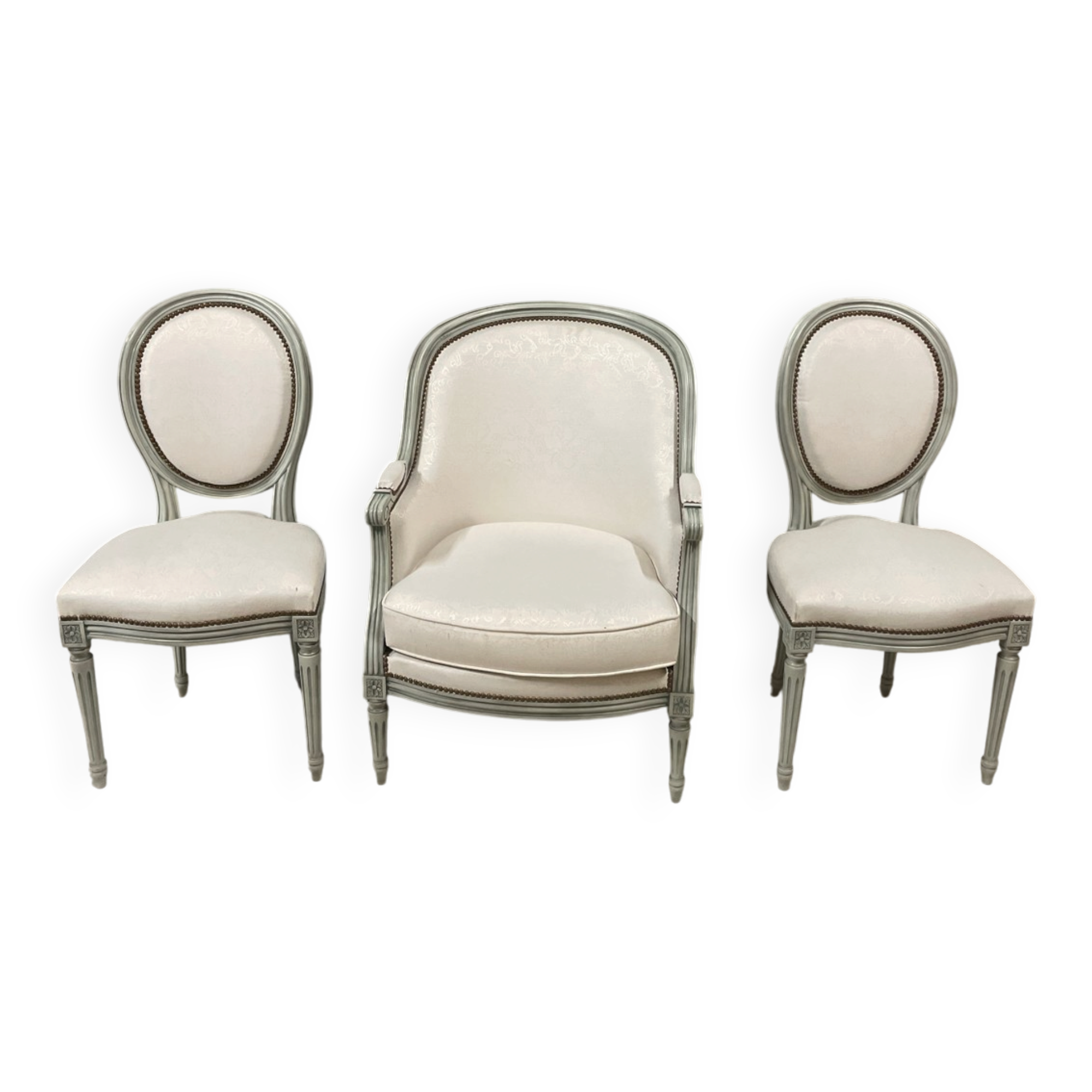 Armchair and 2 chairs set in Louis XVI style, light fabric, patinated wood.
