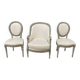 Armchair and 2 chairs set in Louis XVI style, light fabric, patinated wood.