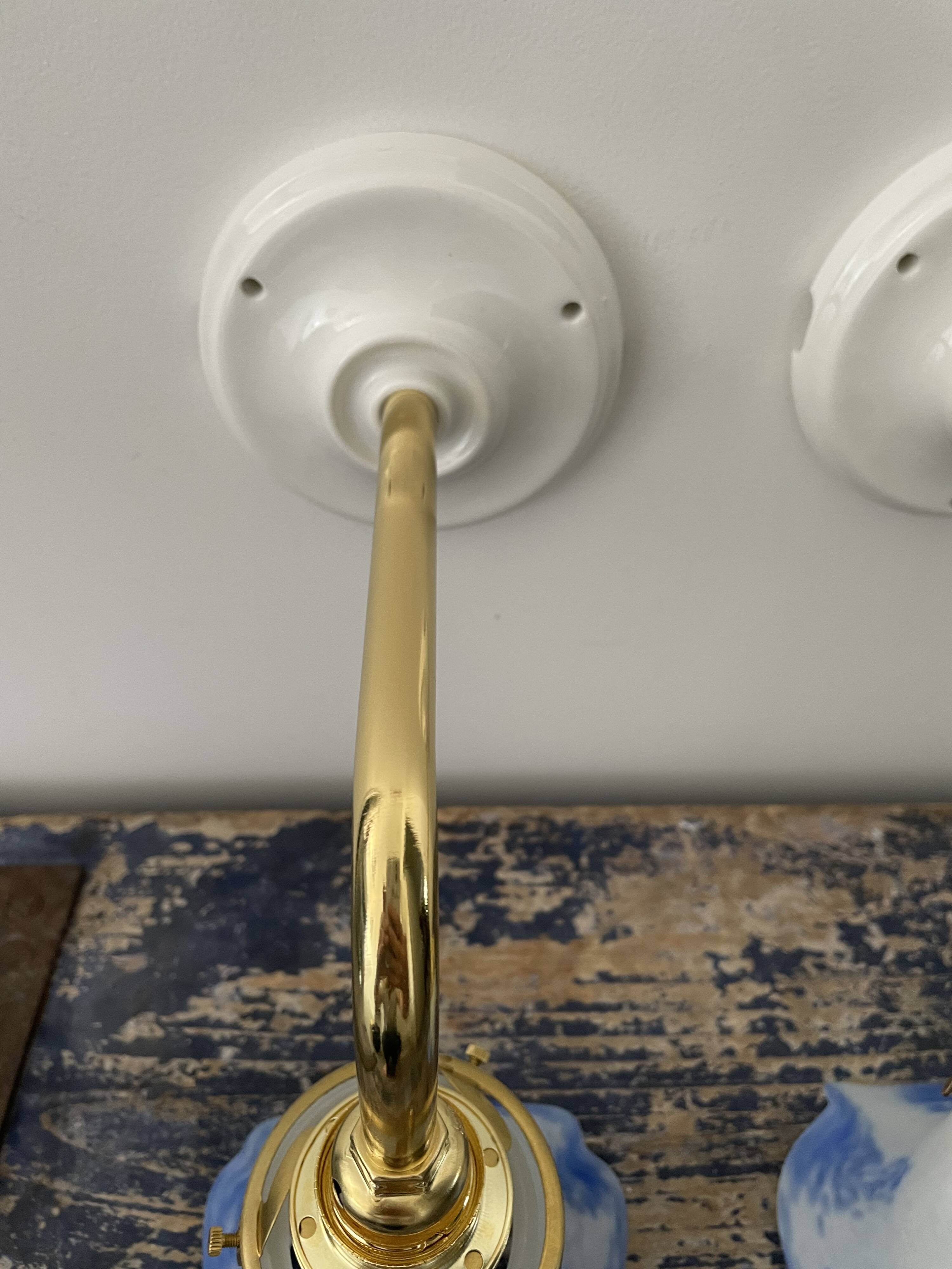 Pair of art deco wall lamps electrified to nine