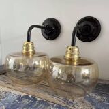 Pair of gold globe wall sconces