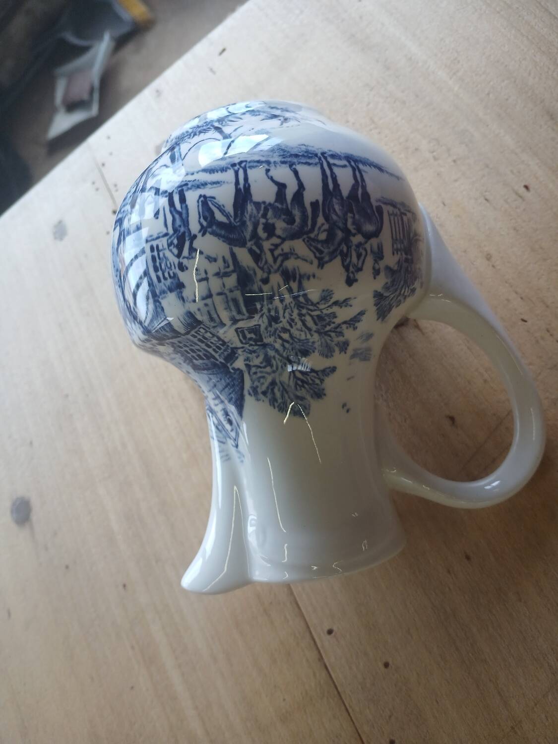 Small old pitcher in iron earth