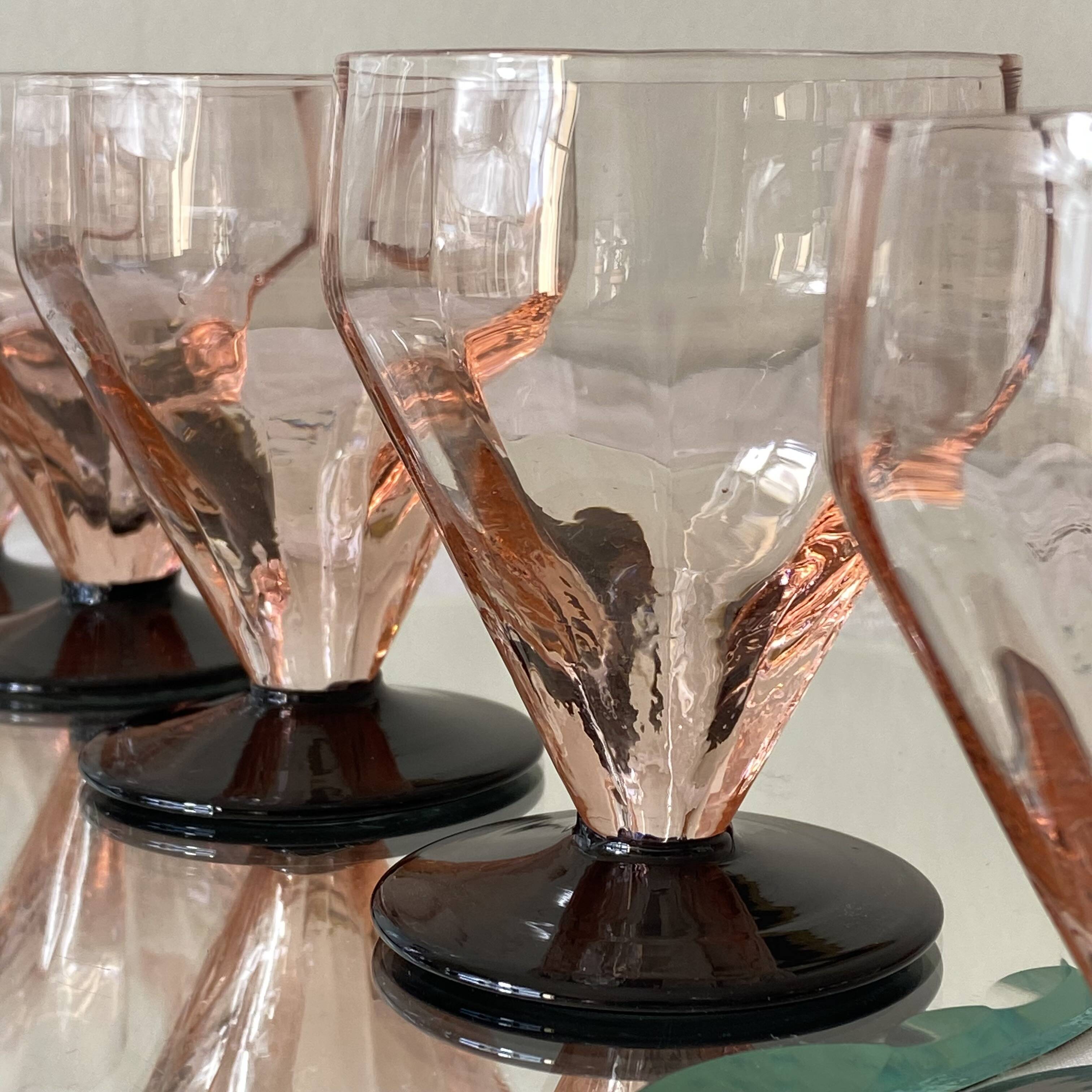 6 Art Deco pink wine or water glasses with black stems.