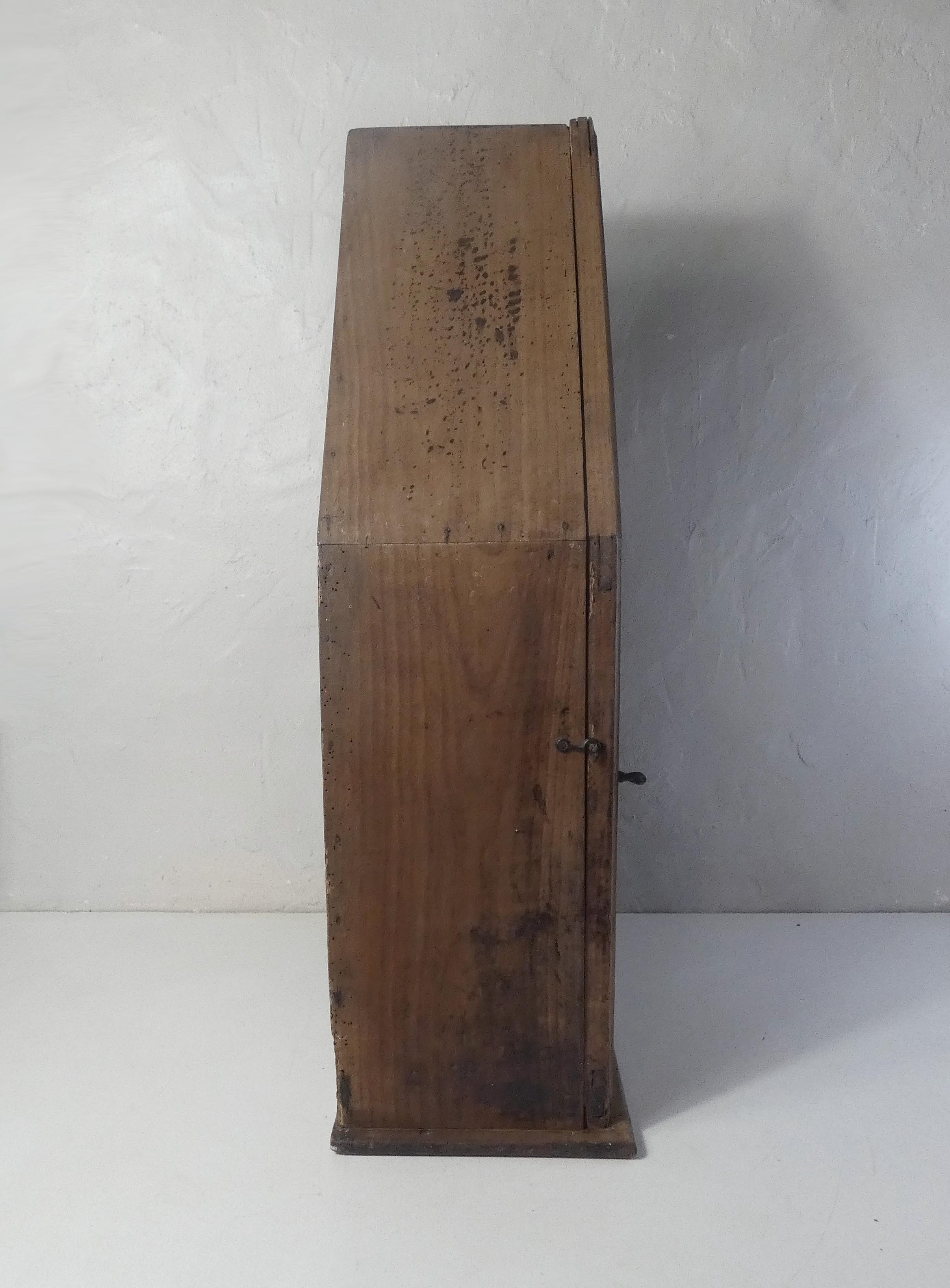 Old niche shelf with glazed statue