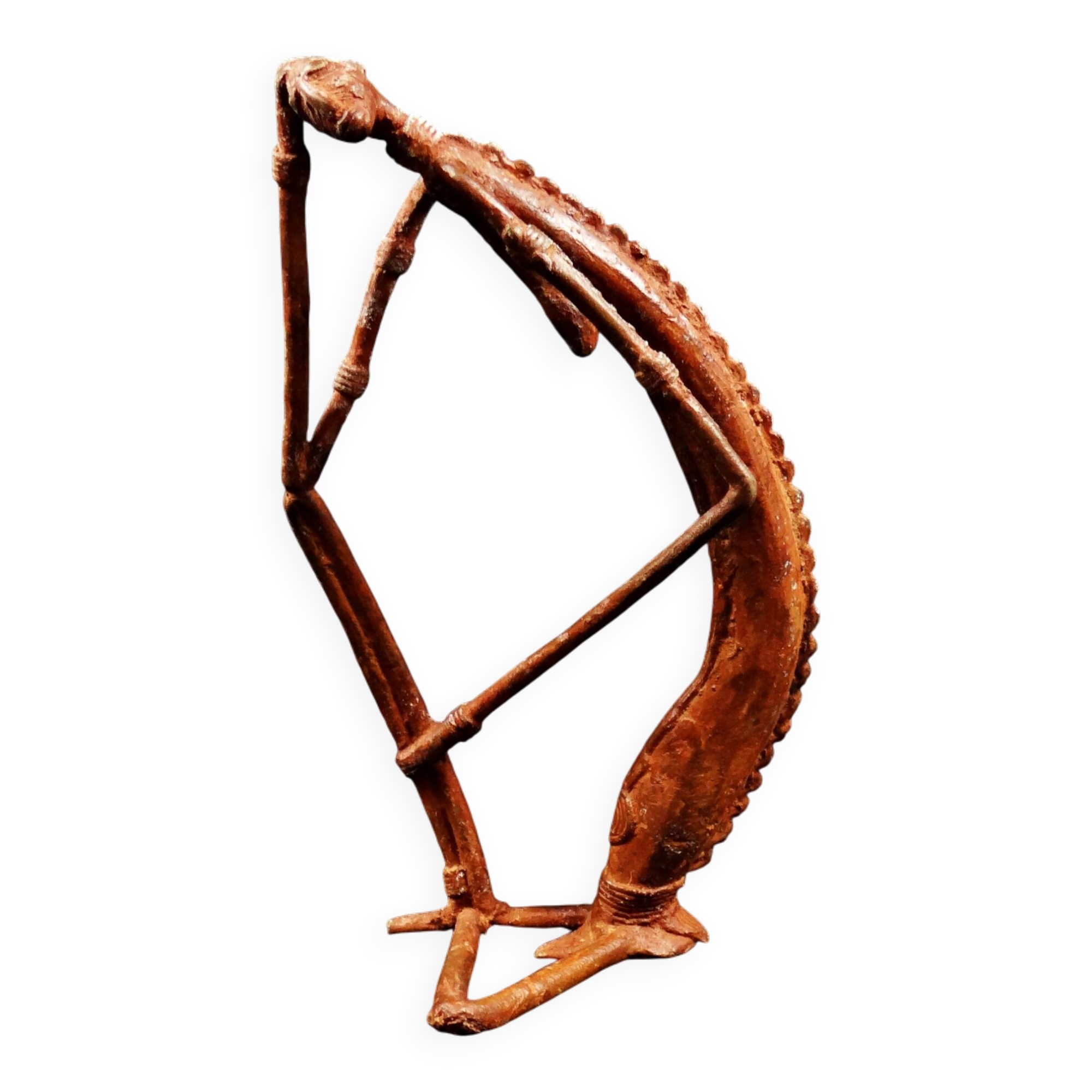 Dogon Nommo bronze statue with brown patina and red highlights, mid-20th century
