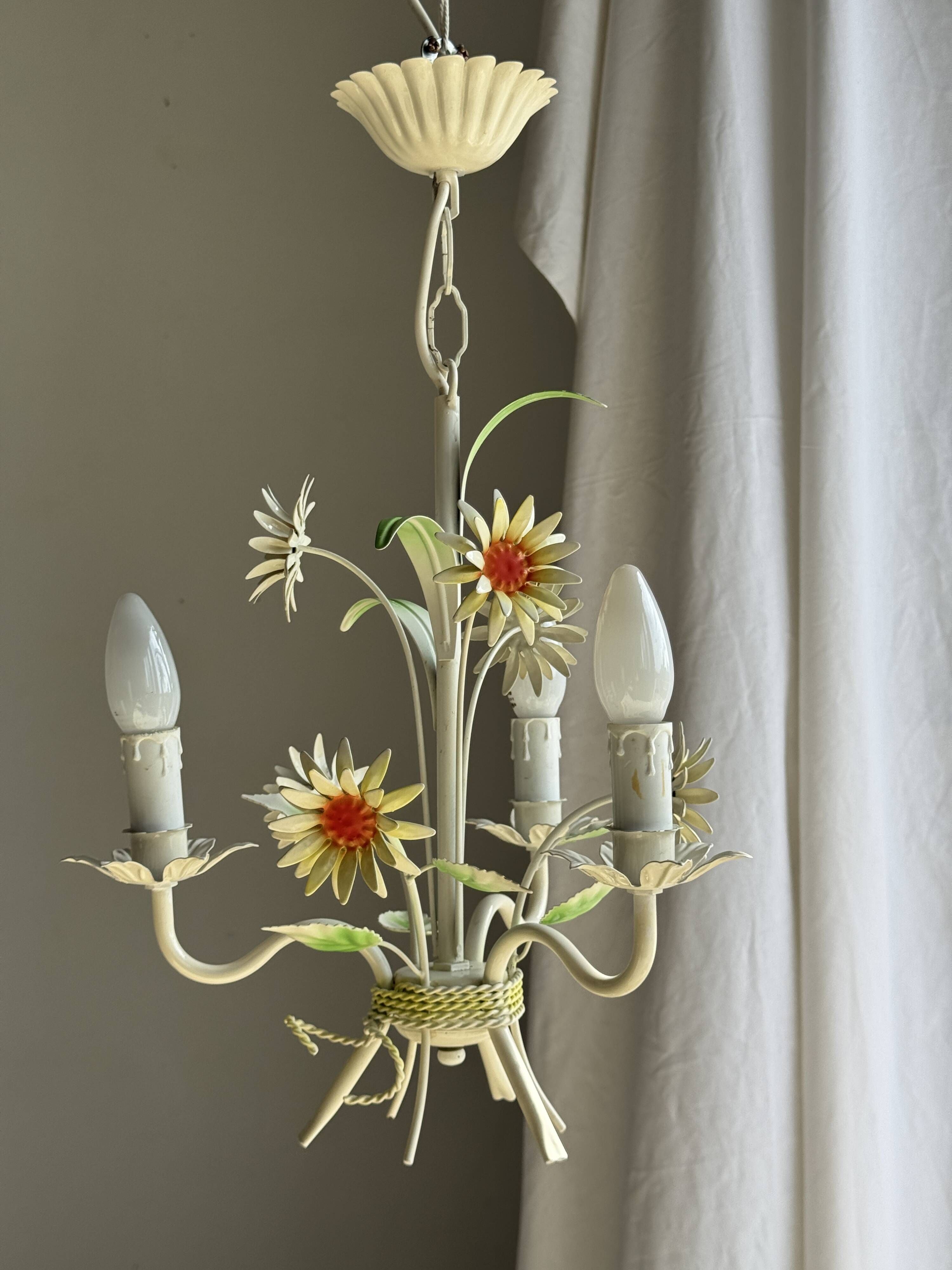 Small vintage cream metal flower chandelier with orange flowers and 3 arms.