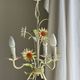 Small vintage cream metal flower chandelier with orange flowers and 3 arms.