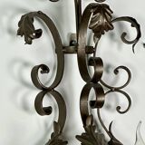 Wrought iron wall lights (pair) with foliage decoration