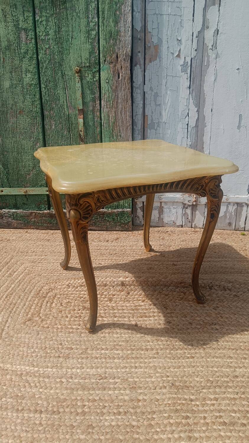 Vintage side table in gilded brass with an onyx top.