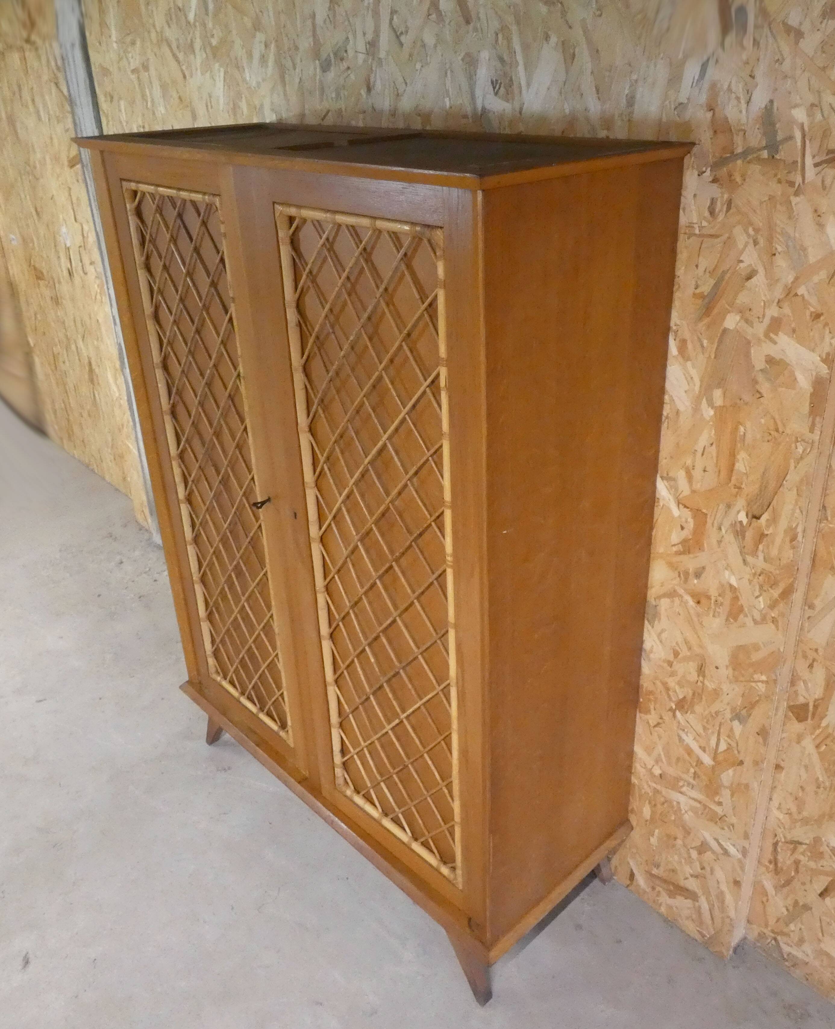 rattan cabinet with compass feet