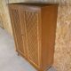 armoire en rotin pieds compas