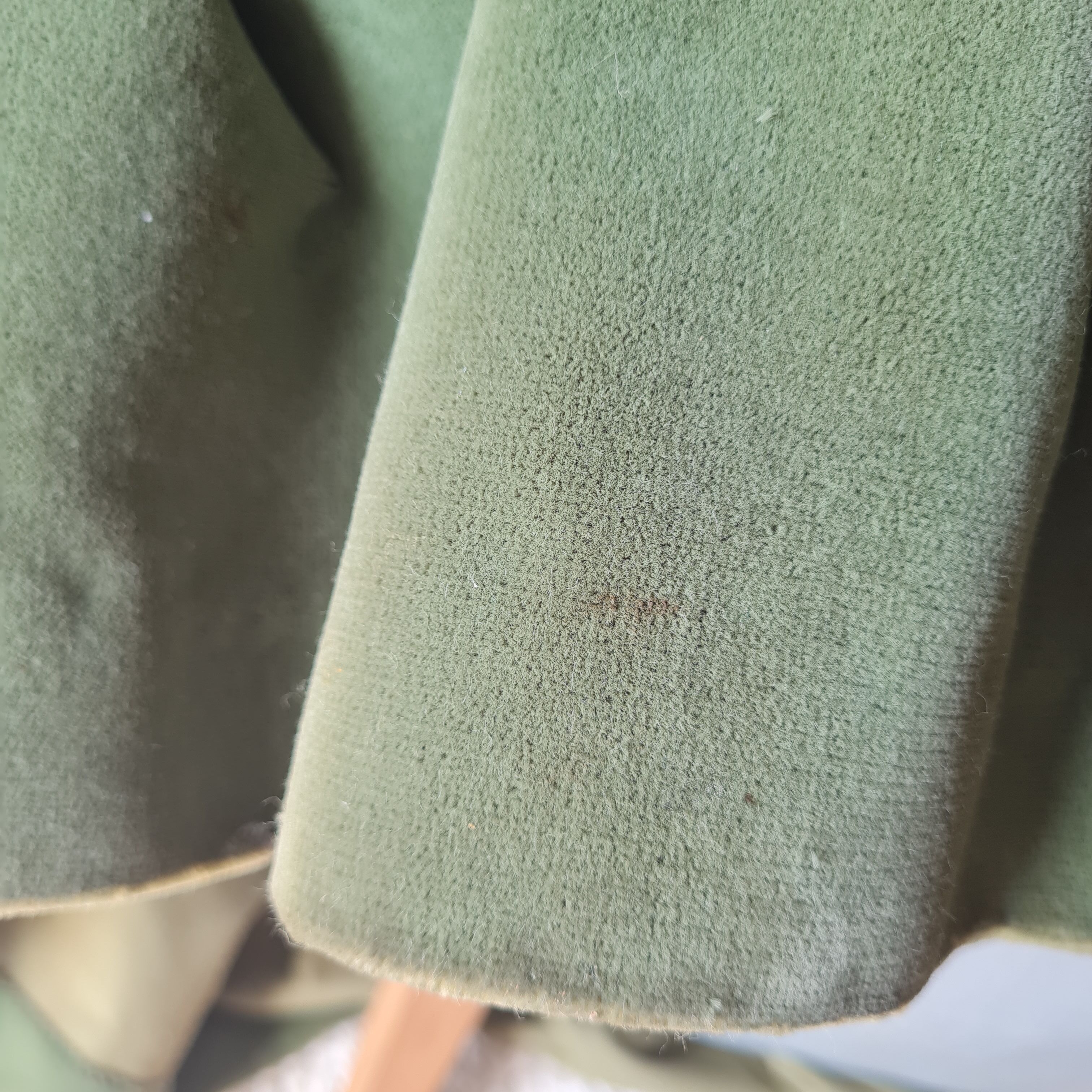 Green velvet armchair
