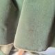 Green velvet armchair
