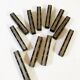 Set of 11 ebony wood knife rests with brass inlay