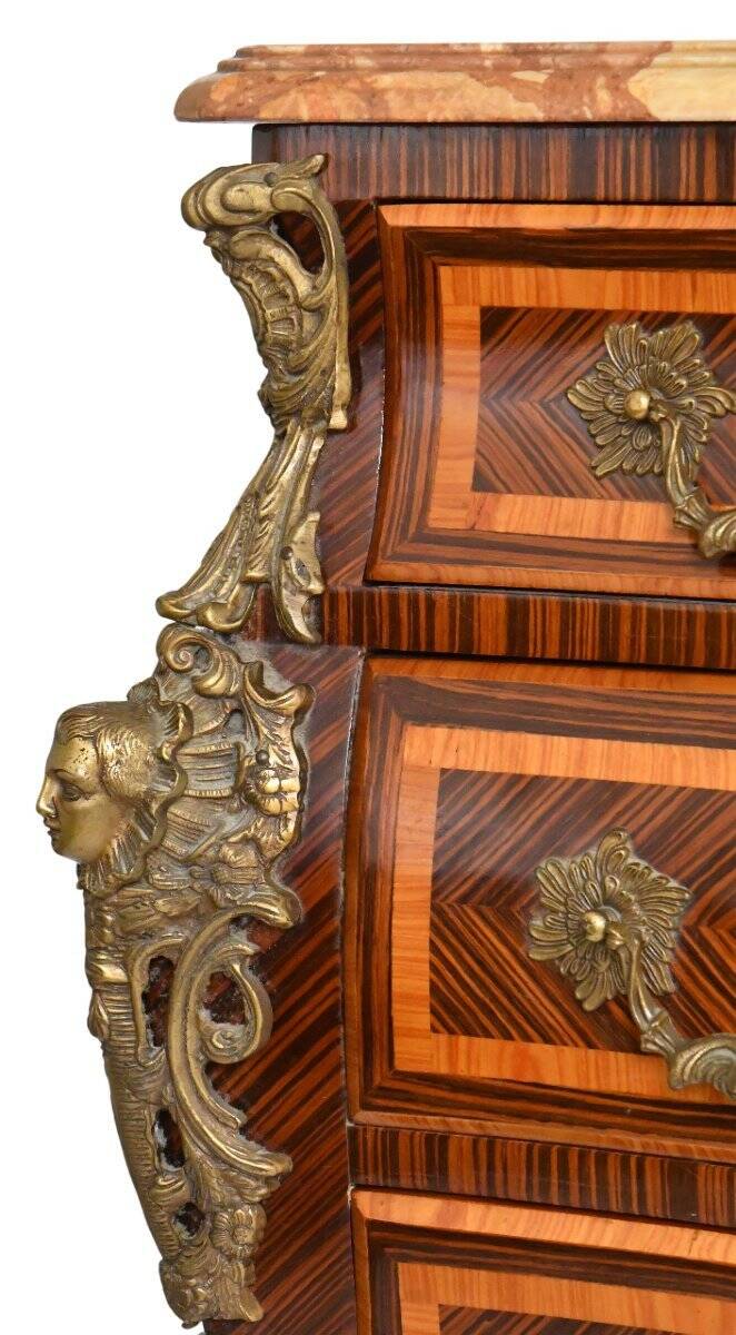 Tomb-shaped commode in Louis XV style with decoration featuring Spanish figures.