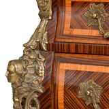 Tomb-shaped commode in Louis XV style with decoration featuring Spanish figures.