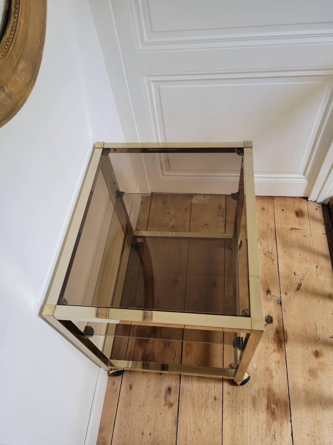 Gold metal and smoked glass serving trolley