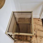 Gold metal and smoked glass serving trolley