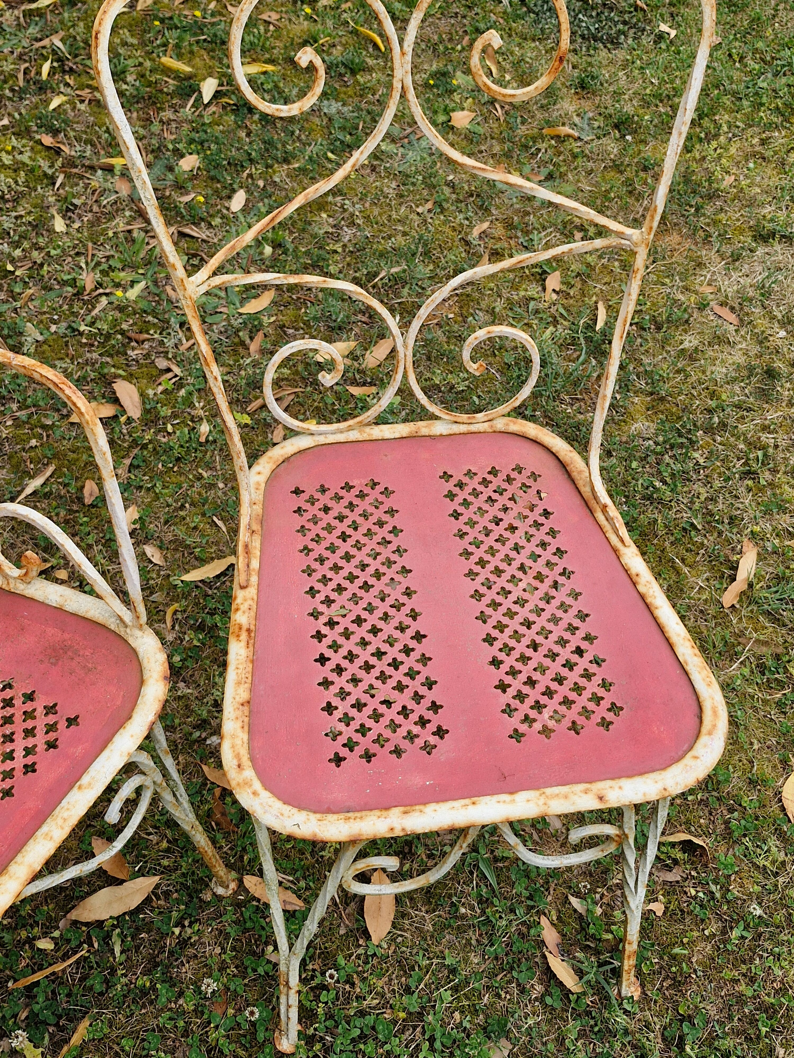 Perforated metal garden chairs and armchairs