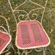 Perforated metal garden chairs and armchairs