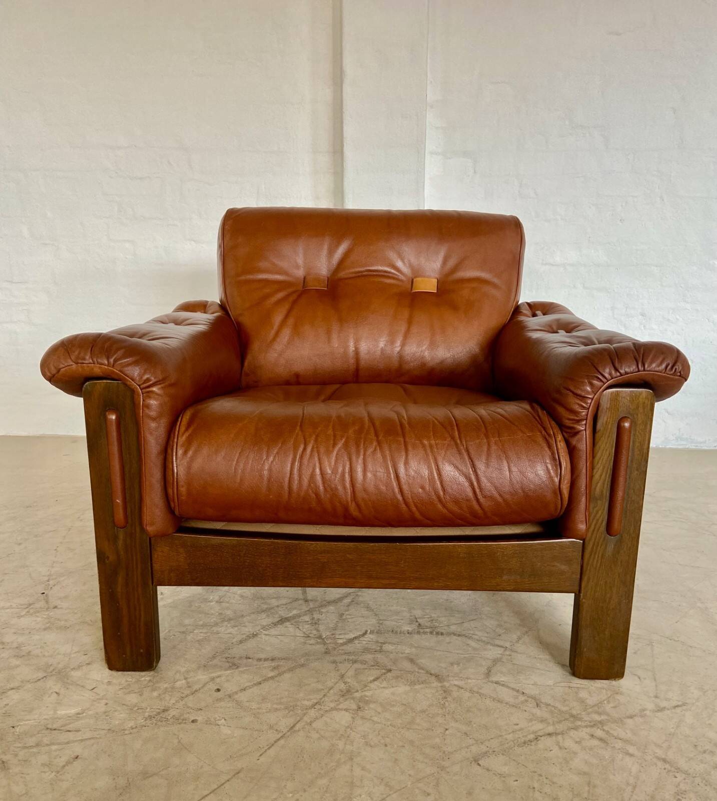 Mid-century vintage Scandinavian leather lounge chair in cognac brown leather