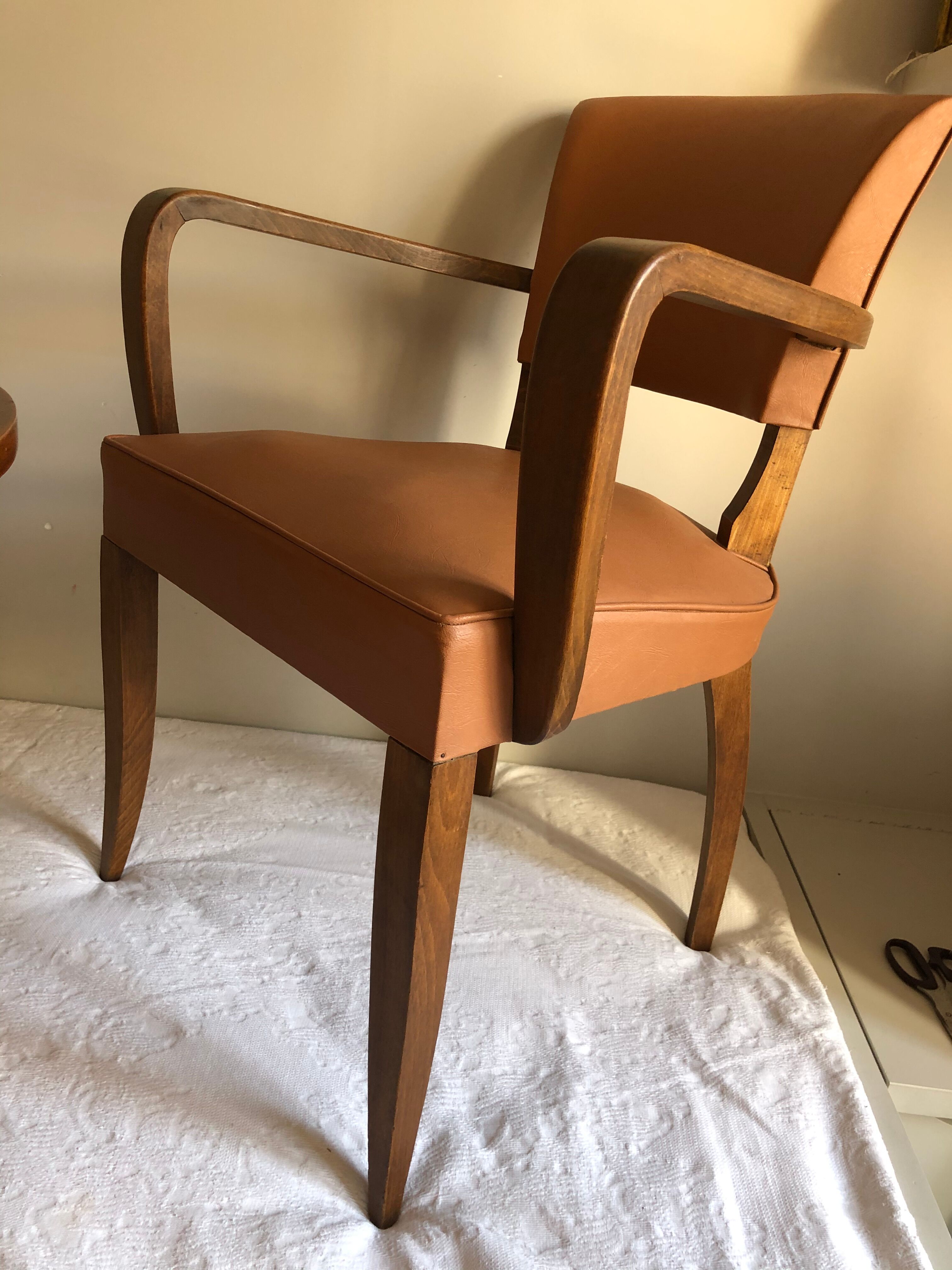 Pair of color wisky wood and skai armchairs 1950