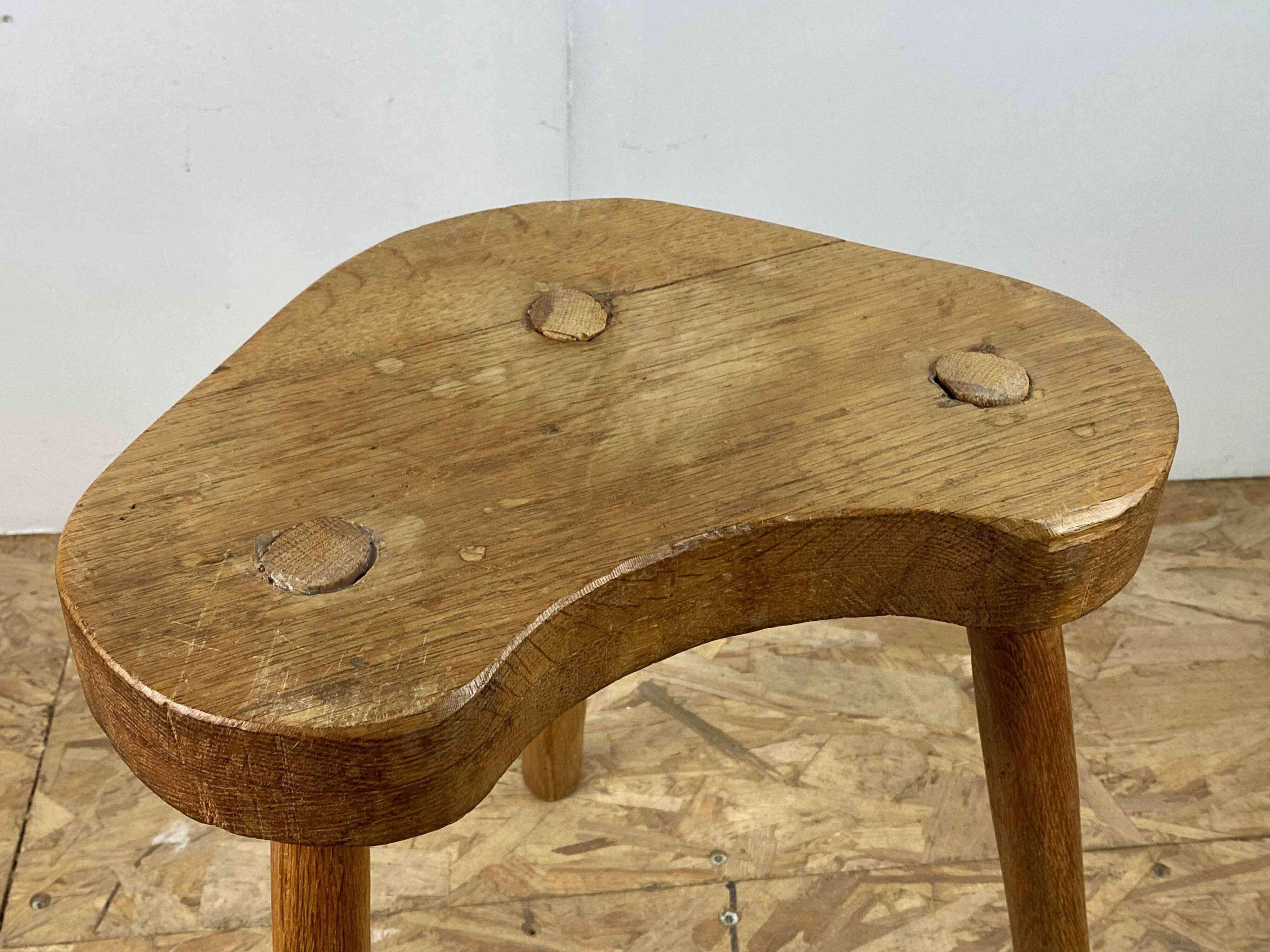 Set of 6 brutalist solid oak tripod farm stools from the 1950s
