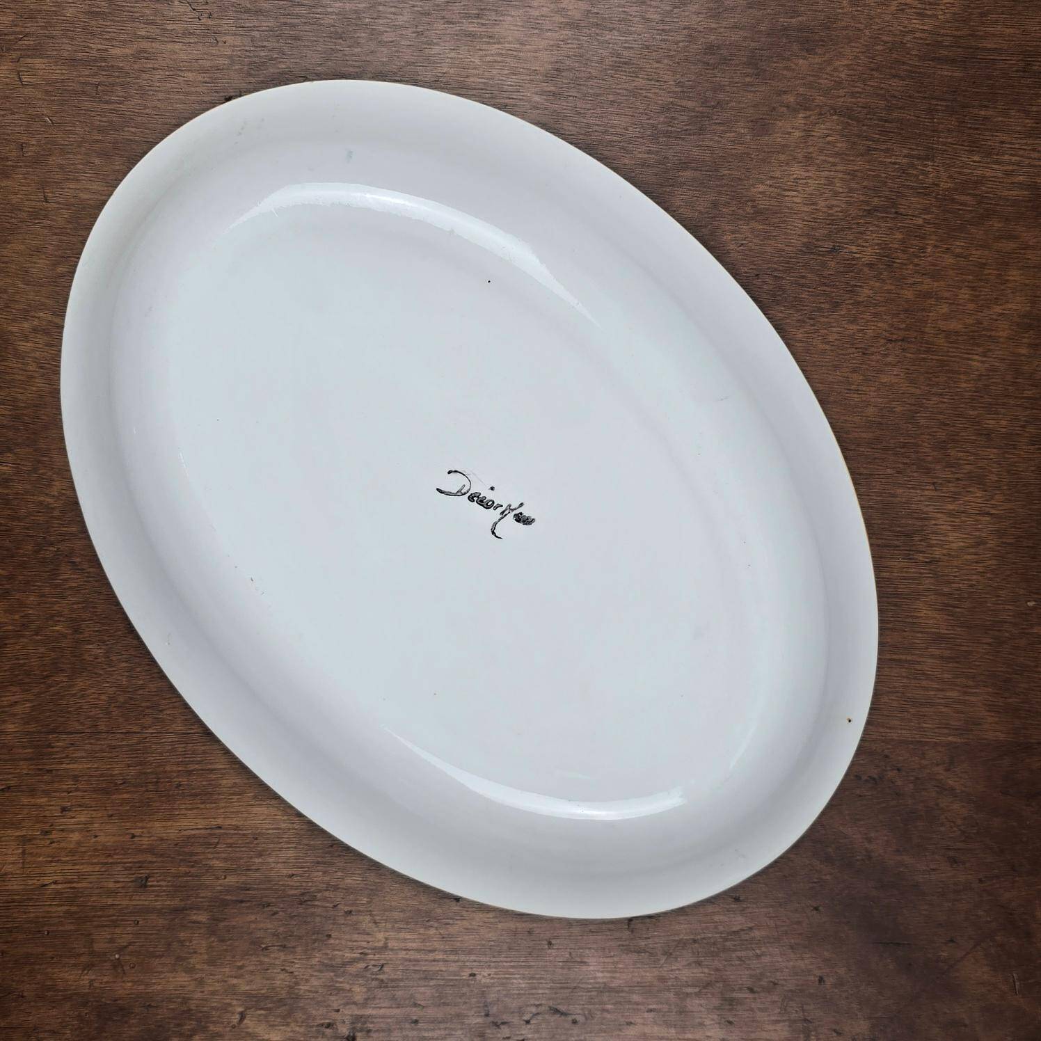 Oval dish decorated with hand-painted blue fish, Mediterranean style