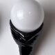 Black ceramic snail and white opaline sconce, France, 1980