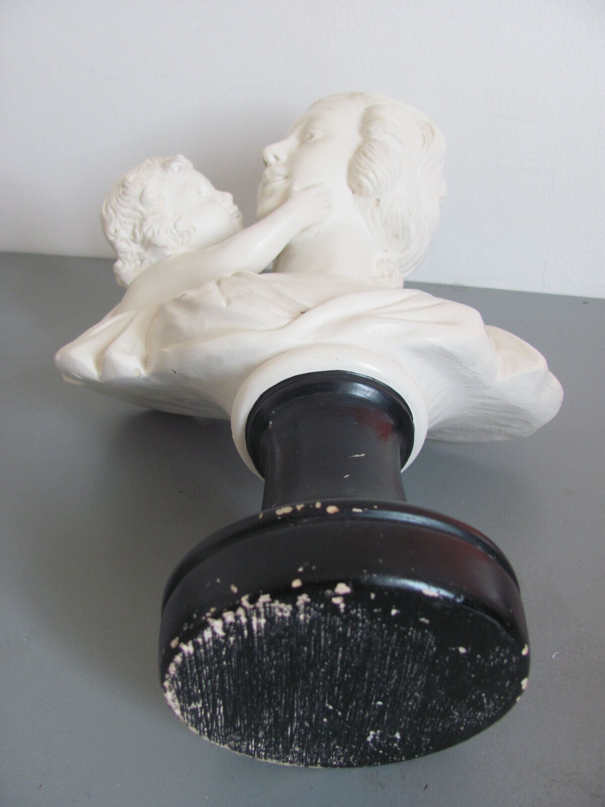 Sculpture in plaster, young mother and child