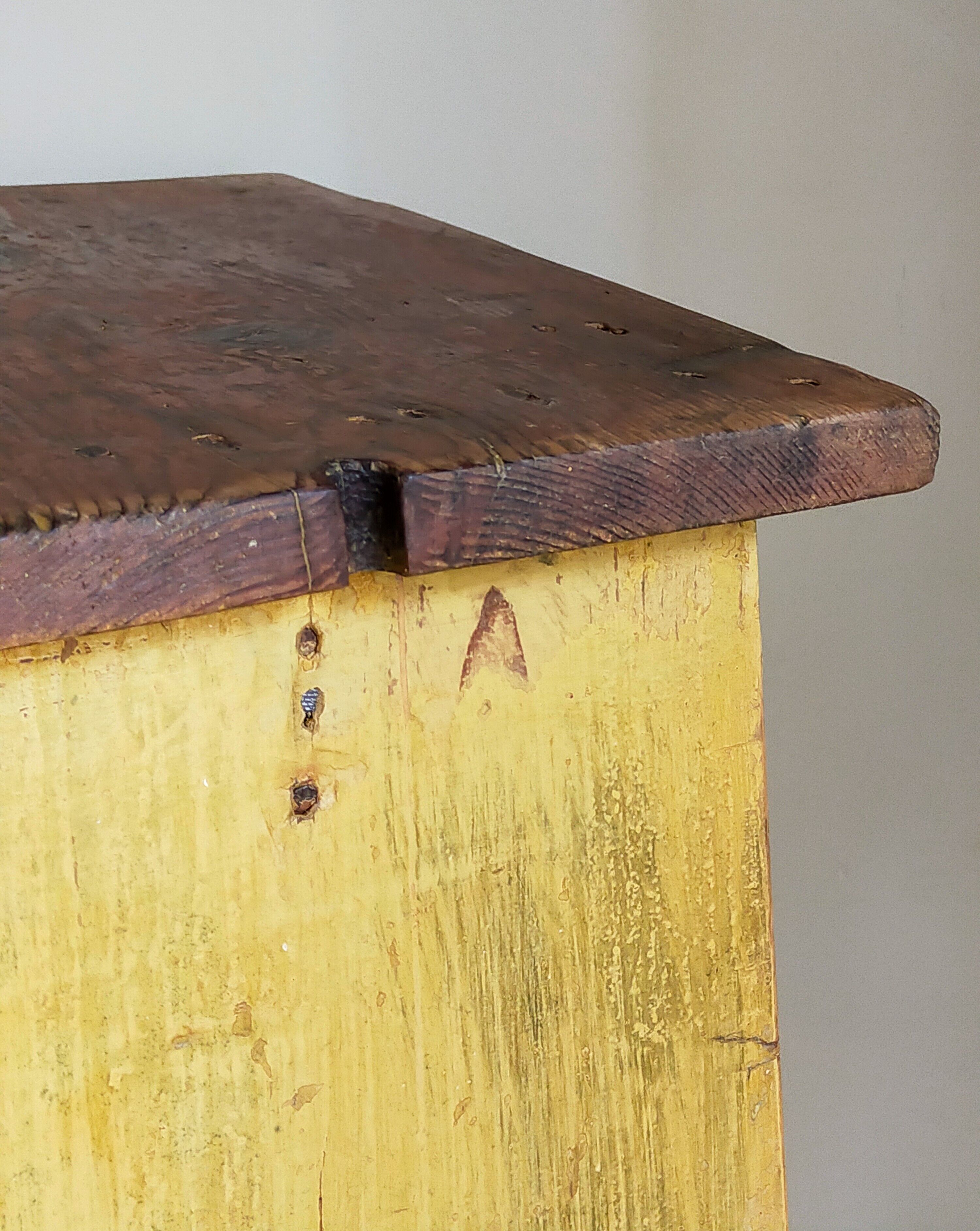 Art-populaire workshop stool in patinated painted wood