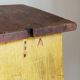 Art-populaire workshop stool in patinated painted wood